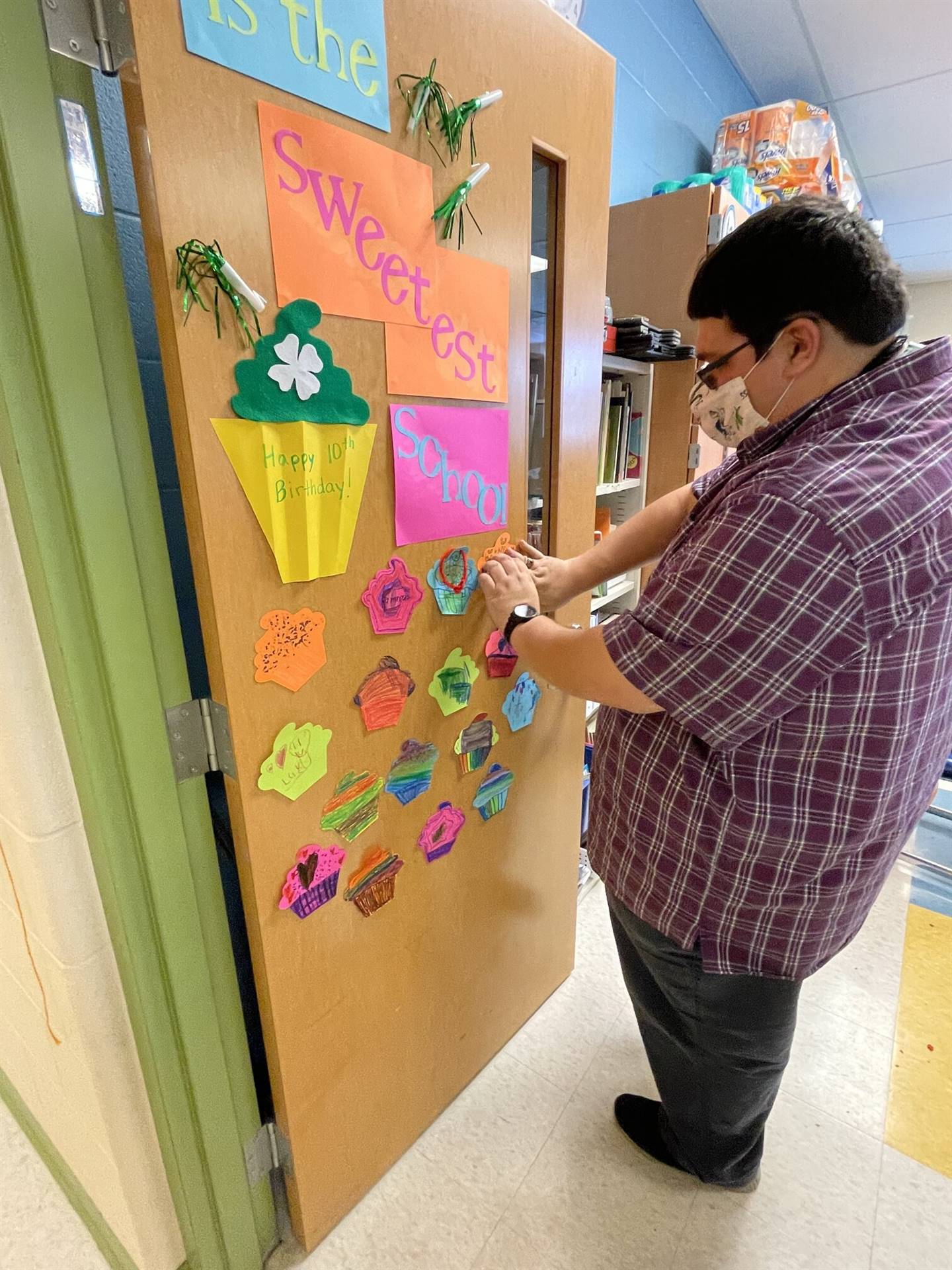 Teacher decorating door